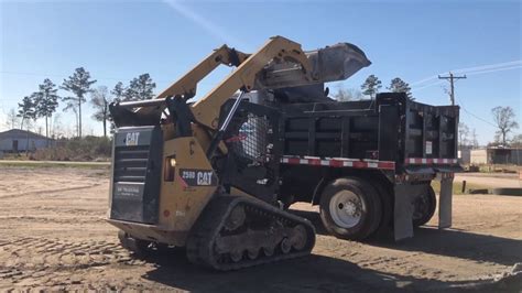 skid steer loading on truck|bobcat dump truck positioning instructions.